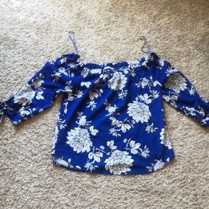 Off the shoulder, royal blue floral blouse.